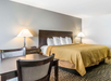 Relax and stay productive with a king bed and desk.