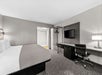Enjoy comfort and functionality with a king bed, TV, mini-fridge, microwave, and work desk.