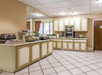 Breakfast area with various breakfast selections.