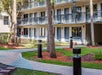 Beautifully landscaped courtyard at Staybridge Suites Royale Parc Suites