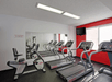 Fitness room with treadmills and other cardio equipment.