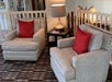 Comfortable cushioned chairs in the hotel lobby.