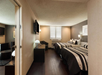 Comfort and convenience with two queen beds and a TV for relaxing after a busy day.