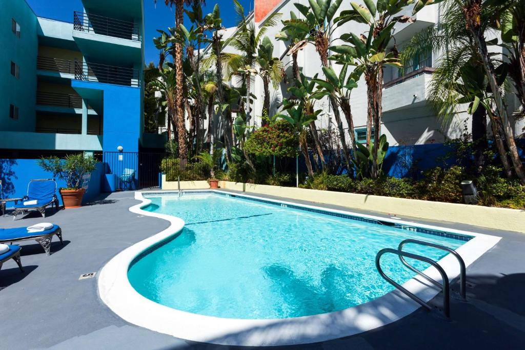 Dive into relaxation at the outdoor pool, the perfect spot to unwind and soak up the sun.