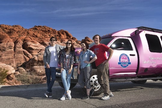 Travel in a luxurious Tour Trekker vehicle with a personal adventure tour guide.