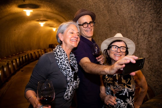 The tourists enjoying taking a selfie - Redwoods and Wine Country Tour in San Francisco, California
