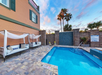 Outdoor pool with day beds
