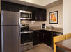 A full kitchen inside a suite room.