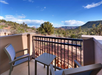 Private balcony with a mountain view.