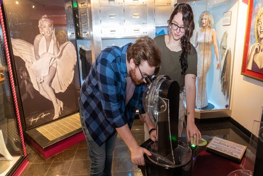 A couple observing an exhibit at Ripley's Believe It or Not! Hollywood.