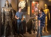Visitors take a photo with the Darth Vader statue made with metal.