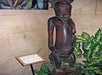 A dark brown and black African statue on display at Ripley's Believe It or Not! Orlando Odditorium in Orlando, Florida.