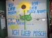 A slab of concrete with a sunflower and several sentences in German painted on it on display at Ripley's Believe It or Not! Orlando Odditorium in Orlando.