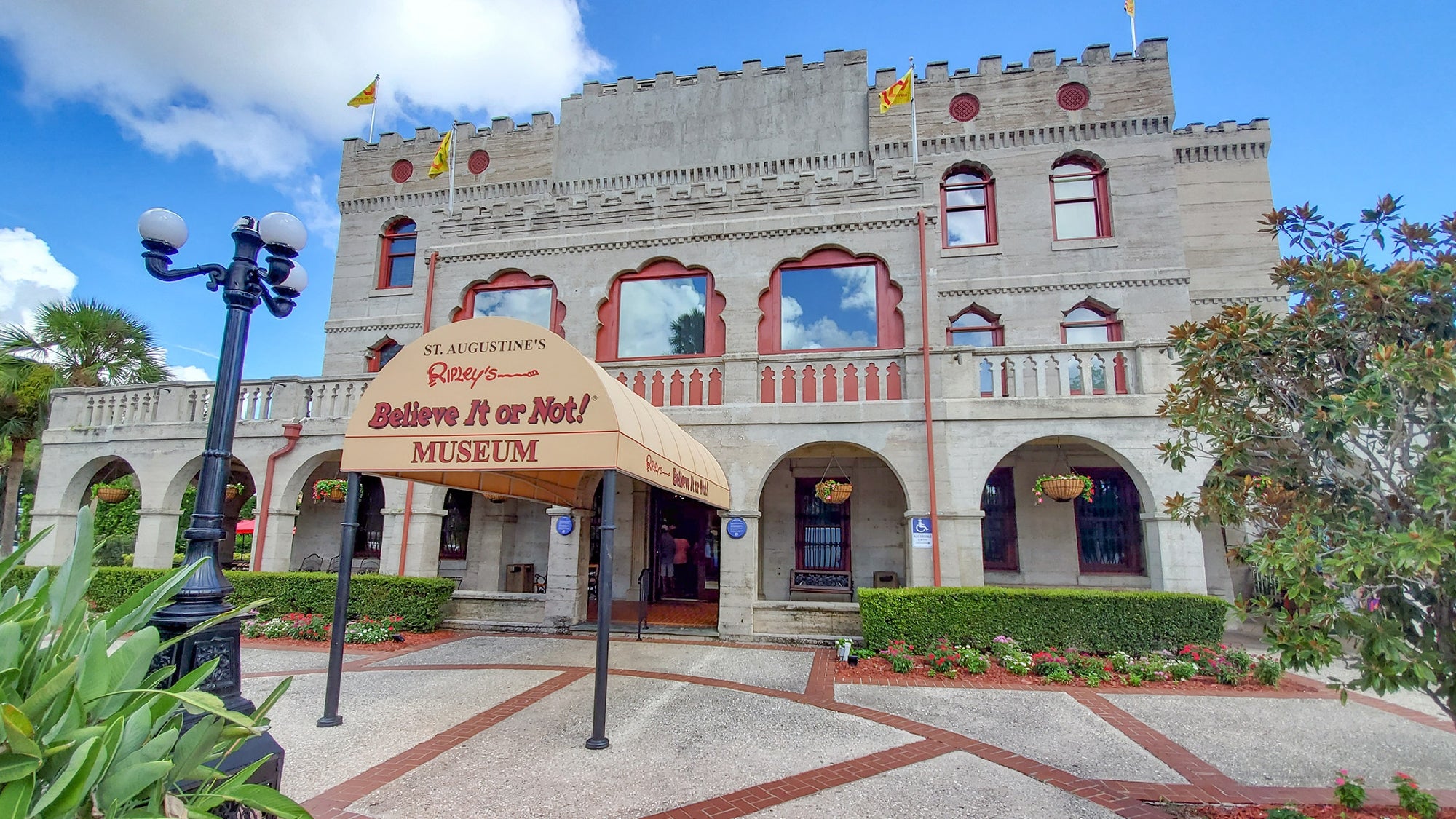 An exterior view of St. Augustine's Ripley's Believe It or Not! Museum, featuring a castle-like facade with a sign above the entrance.