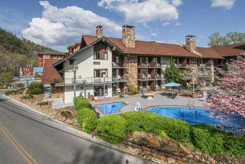 Exterior of the building and the pool area at River Edge Inn in Gatlinburg, Tennessee.