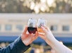 Cheersing drinks while on the train in West Sacramento, California.