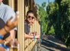 Smiling for a picture while on the train in West Sacramento, California.