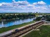 The train going over a bridge in West Sacramento, California.