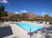 Outdoor pool with view of the hills in the background.