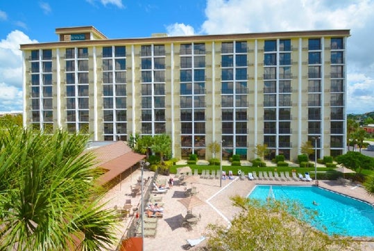 View of the hotel exterior and the pool area.