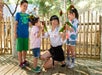Guests are petting rainbow lorikeets at the zoo in San Antonio