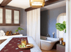 Bathtub inside a private bathroom.