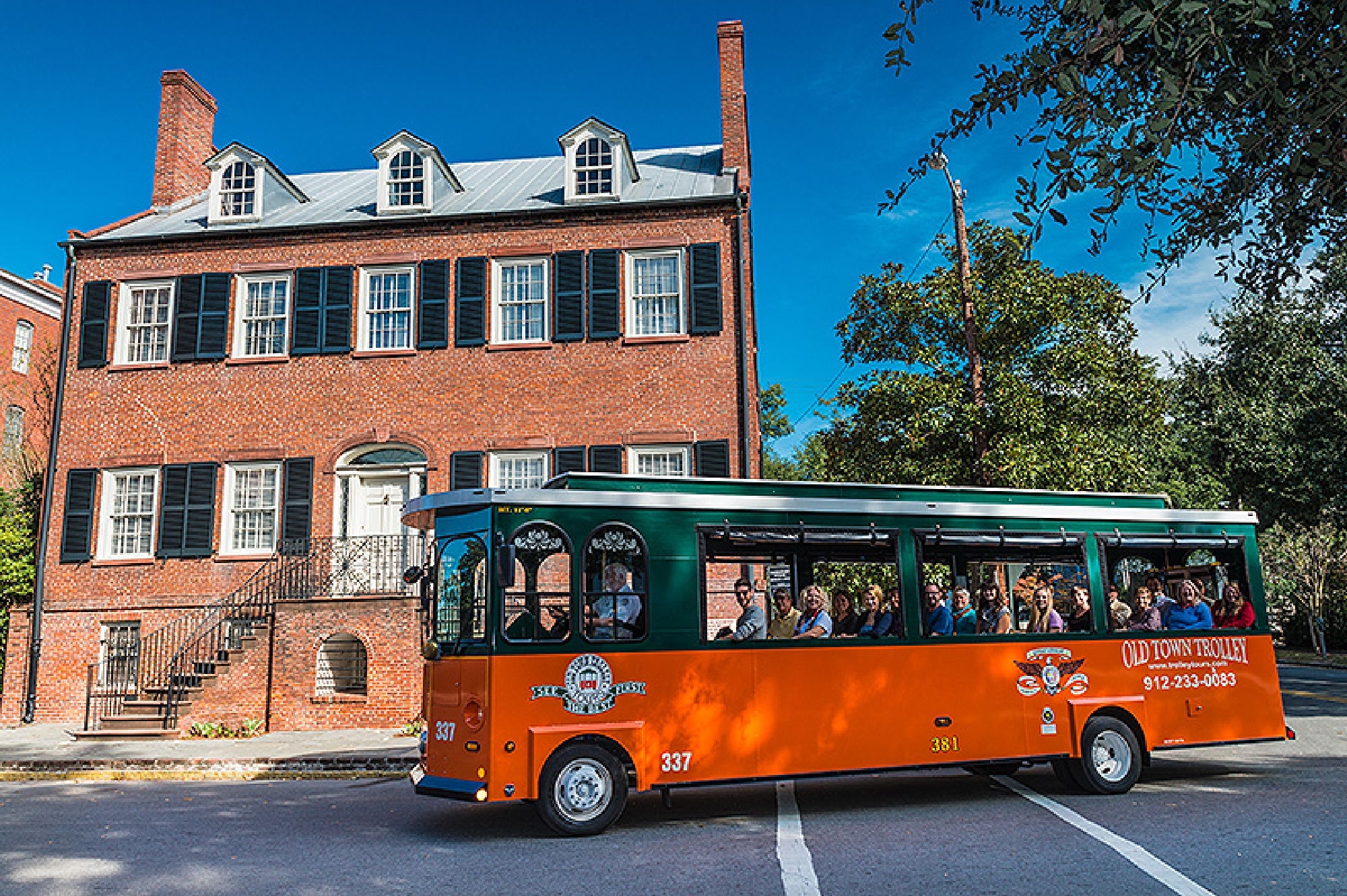 Explore historic Savannah architecture aboard an open-air trolley.