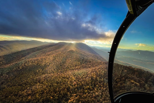 Stunning cabin views of the Appalachian Mountains on a scenic helicopter tour from Asheville, NC.
