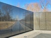 Names etched, reflections cast—Vietnam Memorial honors sacrifice with solemn grace and silence.
