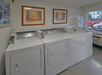 The guest laundry area offers convenient self-service facilities for extended stays.