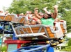 The Great Chase coaster thrills riders with hands in the air as they race alongside Wile E. Coyote and Road Runner.