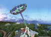 A thrilling amusement park ride that swings riders high above the ground, surrounded by various roller coasters and a lush green landscape.