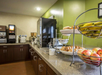 Breakfast area with bagels and fresh fruits