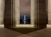 Iconic nighttime view linking Lincoln Memorial and Washington Monument.