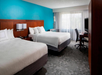 2 Queen beds, work desk at Sonesta Select Boca Raton, FL.