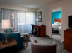 Seating area, flat-screen TV, sofa bed at Sonesta Select Boca Raton, FL.