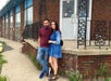 A couple posing in front of the Skyway Diner on the Sopranos Sites Tour in New York City, New York, USA.