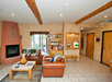 A spacious living area with gas fireplace and comfortable leather sofas.