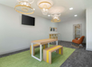 The modern common area provides a cozy and inviting atmosphere for all guests.