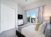 Spectrum Resort Orlando guest room with one king bed.