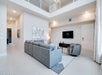 Spacious living area in a two-story guest unit.