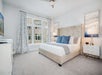 Guest room with one king bed, and premium bedding.