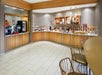 Breakfast area with various breakfast items.