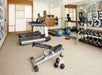 Fitness facility with cardio equipment.