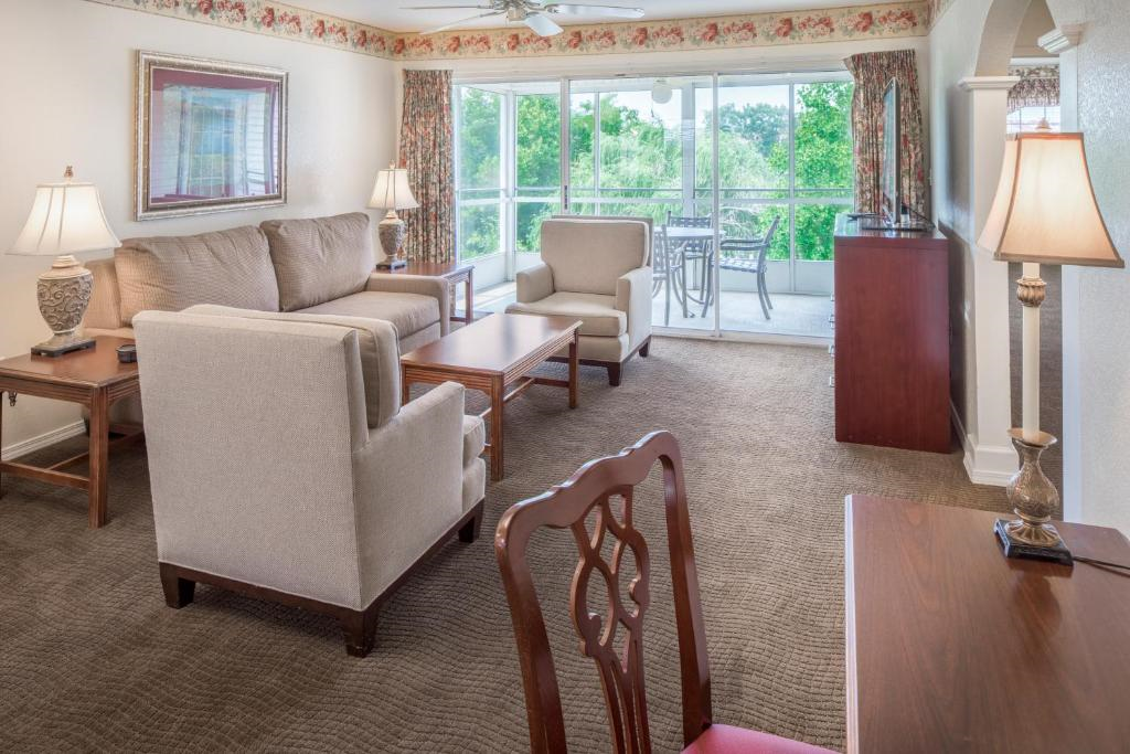 Guest suite with a furnished balcony.