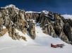 A photo of the plane at the glacier landing with the mountain in the background in Talkeetna, Alaska.