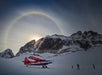 A photo of the plane at the glacier landing with a rainbow in the background in Talkeetna, Alaska.