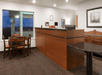 24-hour front desk and seating area.