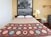 One king bed inside a guest room.