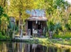 The Trapper's Cabin preserved on the Manchac Swamp shore.